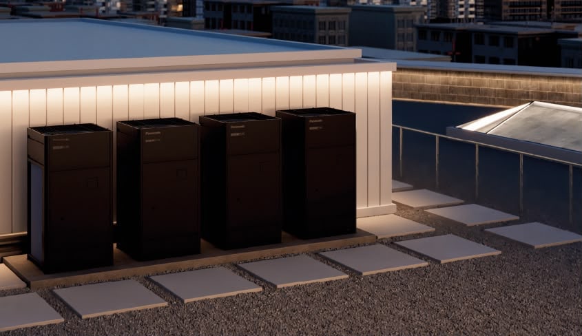 Groupes extérieurs Panasonic ECOi EX installés en toiture-terrasse pour un bâtiment tertiaire